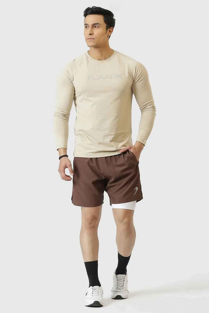 Fuaark Nz 2-in-1 compression shorts in brown, showing a close-up of the stretchy, form-fitting fabric design.