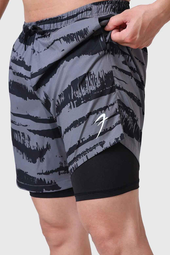 Fuaark Nz 2-in-1 printed compression shorts in gold and grey, designed for active wear and athletic comfort.