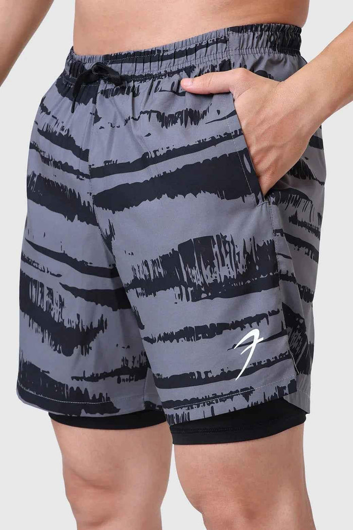 Fuaark Nz 2-in-1 printed compression shorts in gold and grey with a sleek, fitted design for active wear.