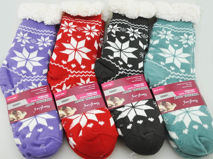 Four pairs of ladies thermal cozy socks from dealonline.co.nz, featuring a 4.7 tog rating for warmth and comfort.