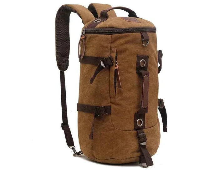Brown 50L canvas hiking backpack by Mead's Supply & Equipment Outfitters, retro style outdoor rucksack with leather accents for men.