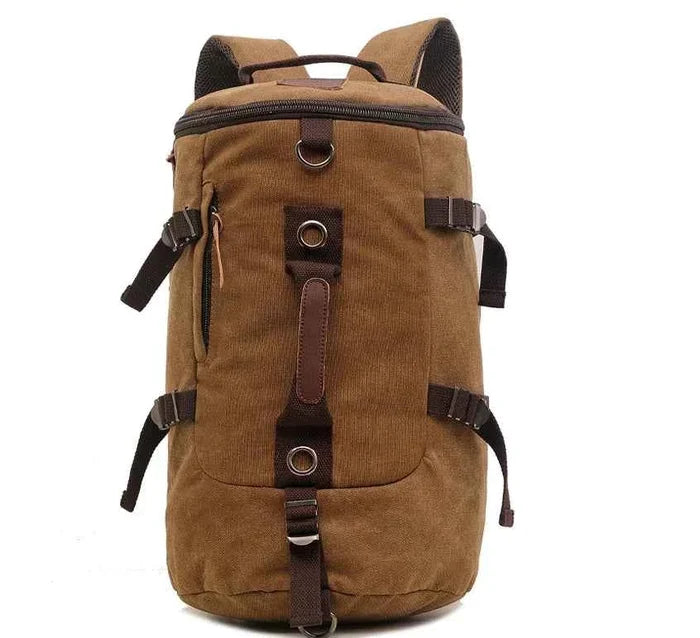 Brown 50L Canvas Hiking Backpack by Mead's Supply & Equipment Outfitters with retro style, leather accents, ideal for outdoor travel.