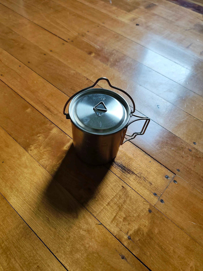 750ml stainless steel camp cook pot with lid and hanging hook, compatible with fire and gas, by Mead's Supply & Equipment Outfitters