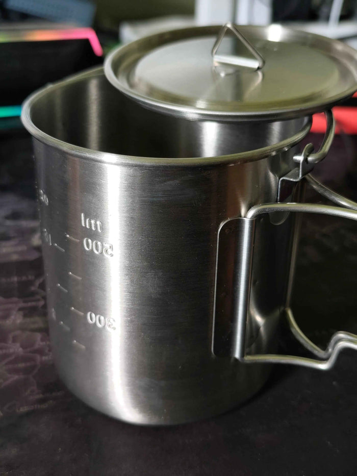 Stainless steel 750ml camp cook pot with lid and hanging hook, compatible with fire and gas, by Mead's Supply & Equipment Outfitters