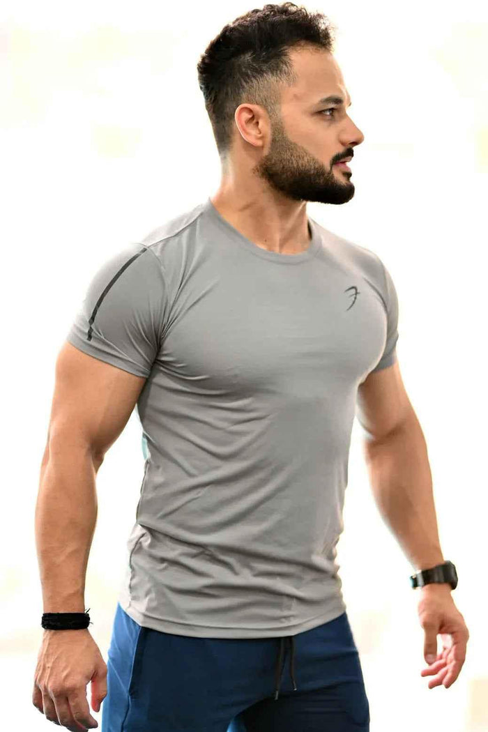 Light grey Apex T-shirt by Fuaark Nz, featuring a classic crew neck and soft cotton fabric, displayed on a hanger.