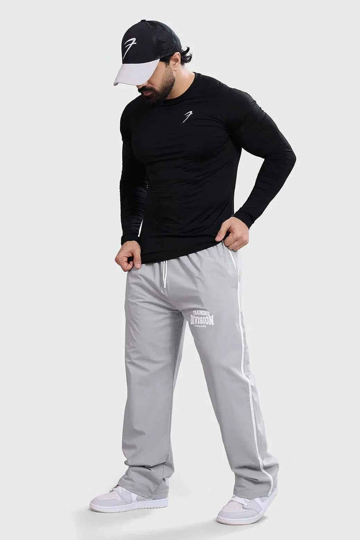 Black Bare Nylon Fullsleeves T-shirt by Fuaark Nz, featuring a sleek design and long sleeves, perfect for casual wear.