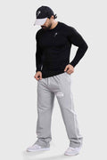 Black Bare Nylon Fullsleeves T-shirt by Fuaark Nz, featuring a sleek design and long sleeves, perfect for casual wear.