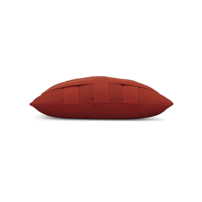 Side image of Rust red outdoor pillow with solid design for bold outdoor accents