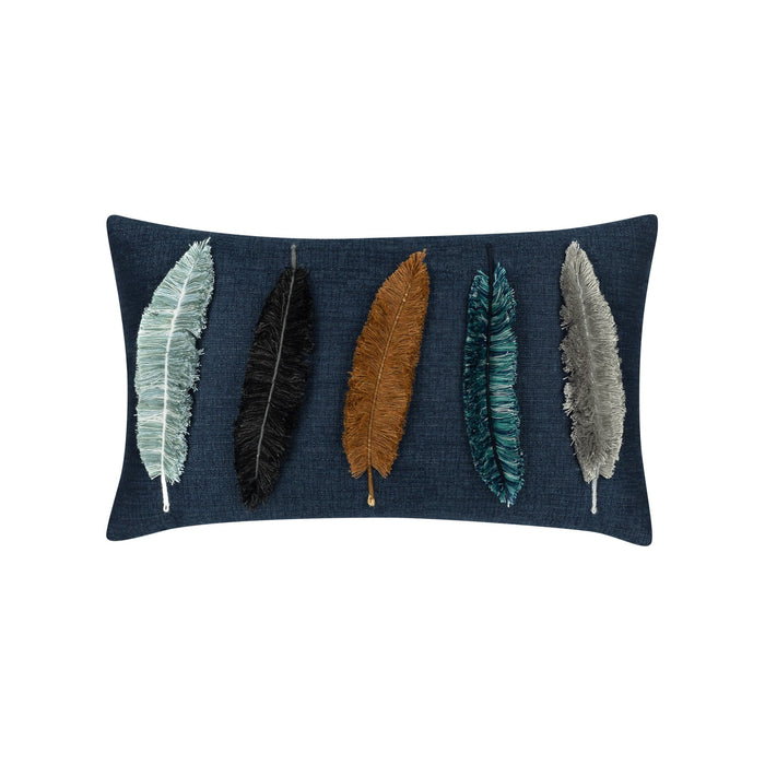 Outdoor lumbar pillow in denim with appliqued leaf pattern for coordinated outdoor decor