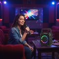 Dealonline.co.nz Bluetooth speaker with built-in microphone, compact design, black color, and versatile connectivity options.