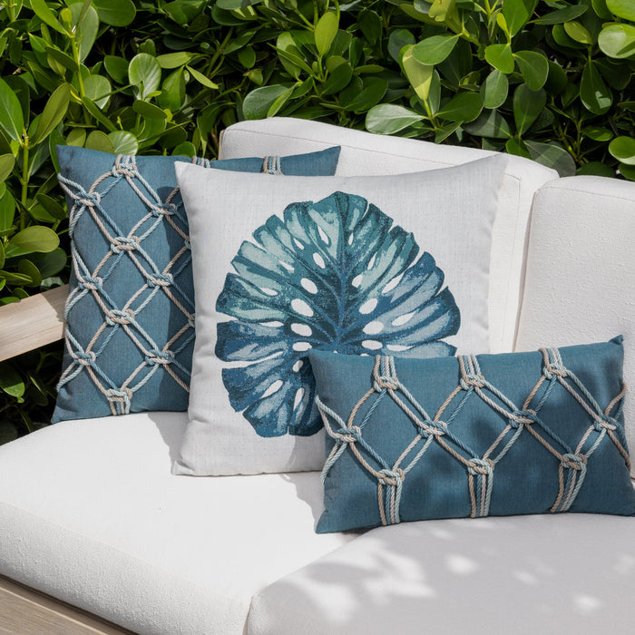 Outdoor image of pillows in Solid lagoon blue outdoor safe woven fabric with soft finish – Cast Lagoon by Elaine Smith