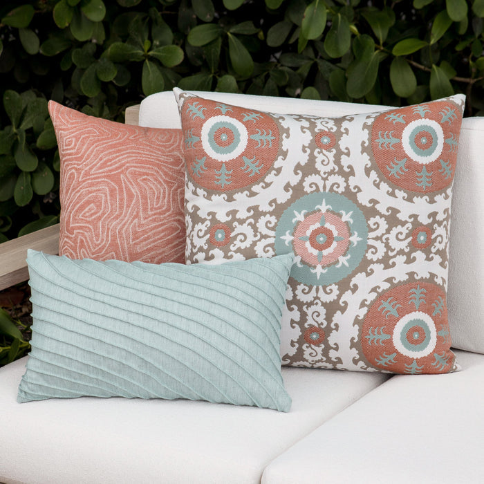 Outdoor image of pillows in Chari Spice – outdoor-safe woven fabric by Elaine Smith, ideal for high-end commercial and residential applications.