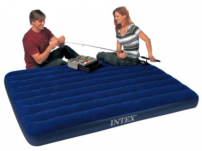 Inflatable mattress by Intex, 152x203x25cm, classic Downy model, suitable for sleeping or camping.