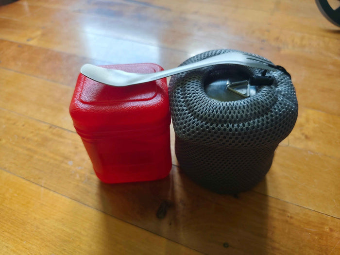 Complete camp kitchen bundle with pot, burner, and titanium utensil from Mead's Supply & Equipment Outfitters for camping gear.