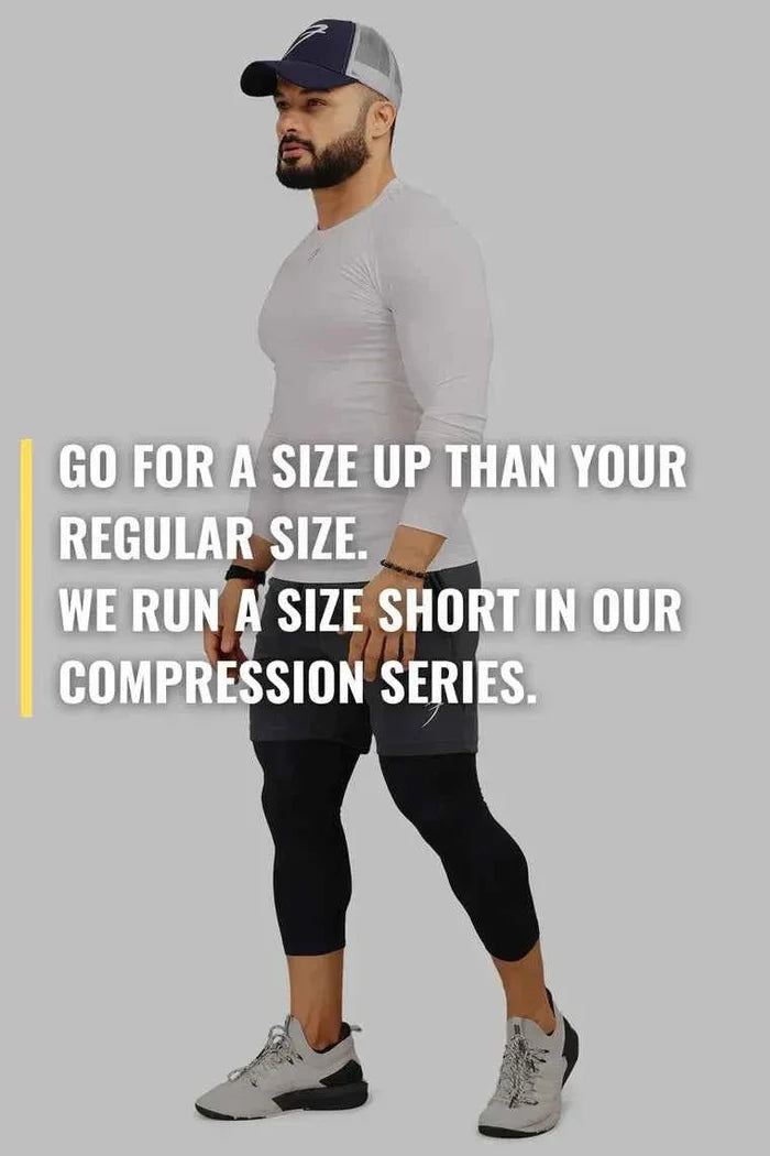 White Fuaark Nz compression full sleeves T-shirt designed for enhanced athletic performance and muscle support.
