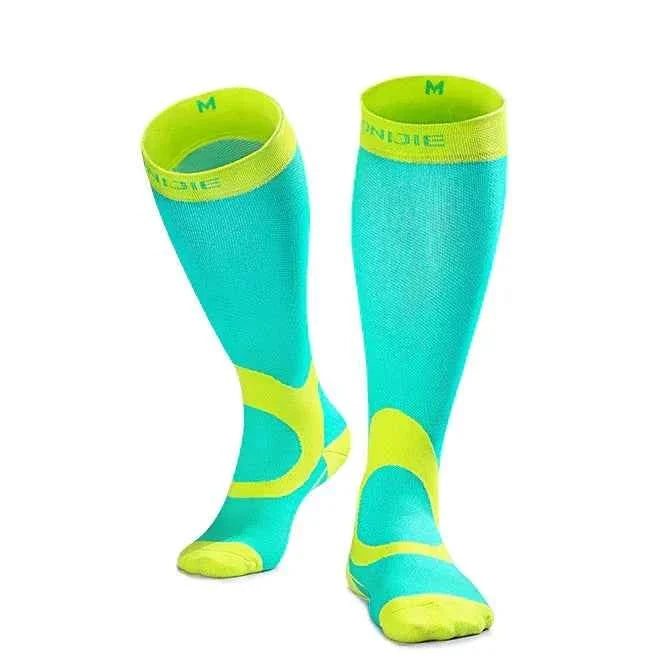 Green compression socks for cycling, running, and sports by Mead's Supply & Equipment Outfitters, made of nylon athletic support material.