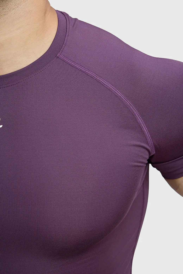 Fuaark Nz plum compression T-shirt for men, fitted athletic tee with short sleeves and moisture-wicking fabric.