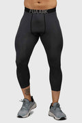 Dark grey Fuaark Nz compression tights, close-up showing snug fit and stretchy fabric, designed for comfort and support.