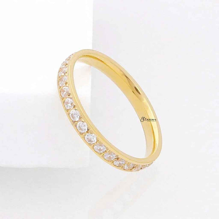 Gold CZ fully inlay stainless steel band ring by Glitters, showcasing a sleek design with sparkling CZ stones.