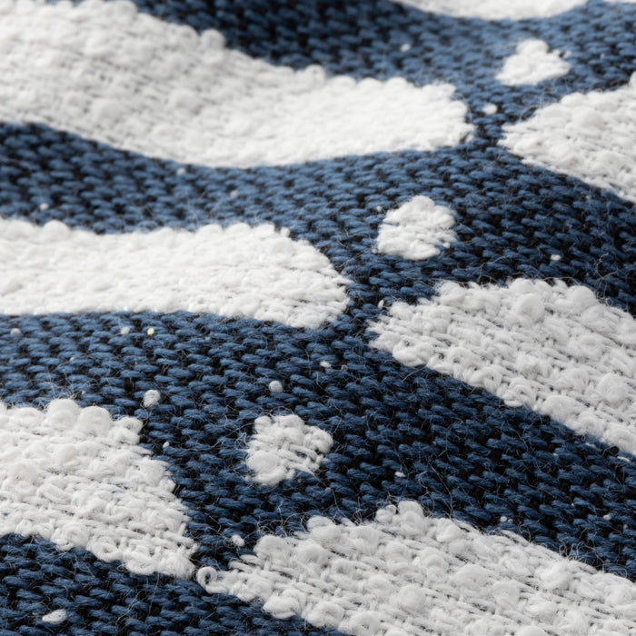 Close-up of blue and white striped fabric texture