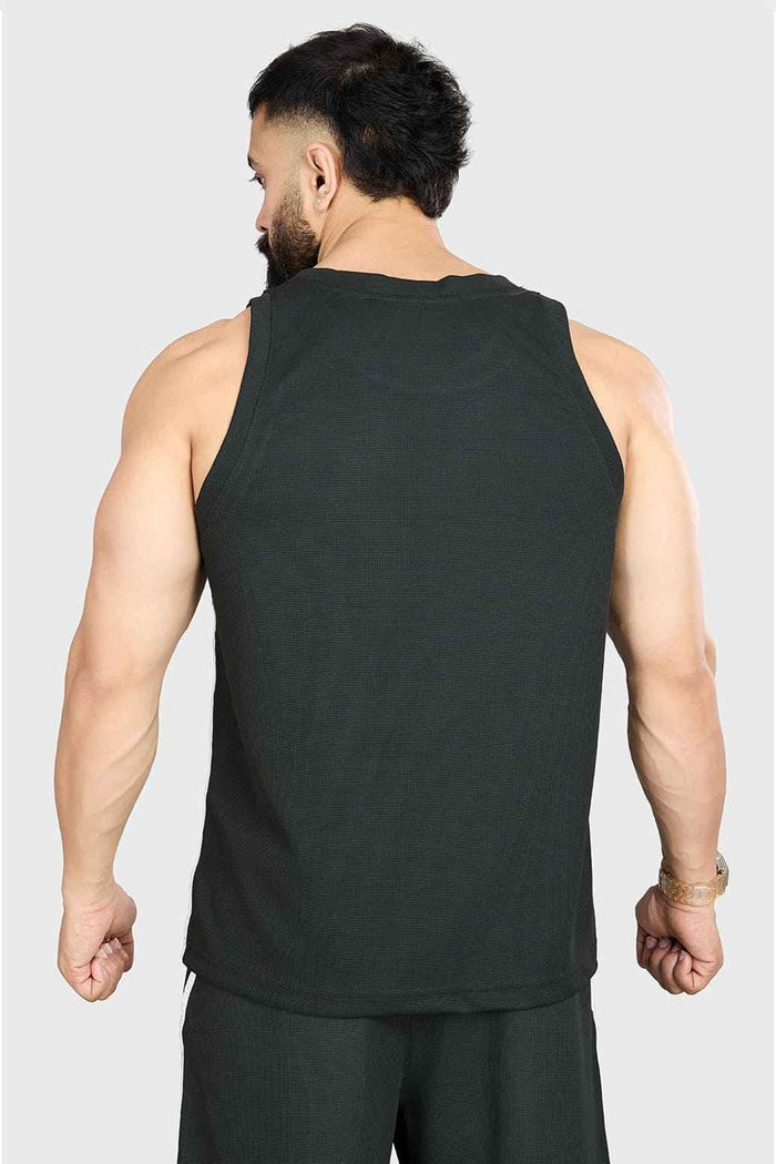Fuaark NZ drip olive oversized tank top made of soft, breathable cotton with a relaxed fit, ideal for casual wear.
