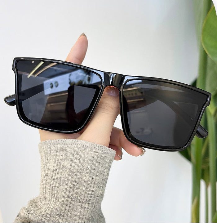 ECOTREK black retro square sunglasses with lightweight design and UV380 protection, suitable for men and women.