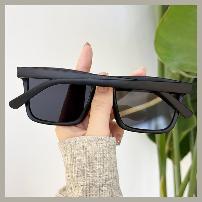 ECOTREK black retro square sunglasses with UV380 protection, lightweight fashion shades for men and women.