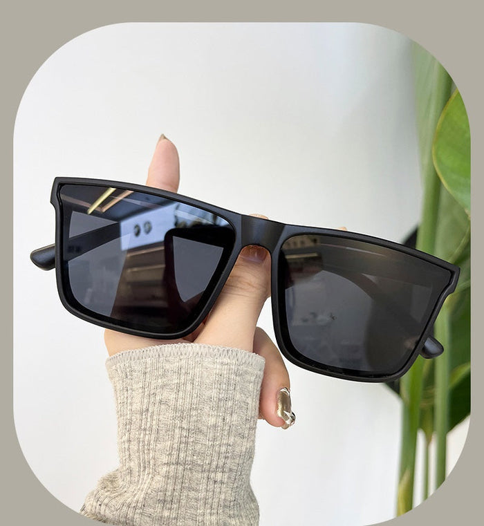 ECOTREK black retro square sunglasses with lightweight frame and UV380 protection, suitable for men and women.