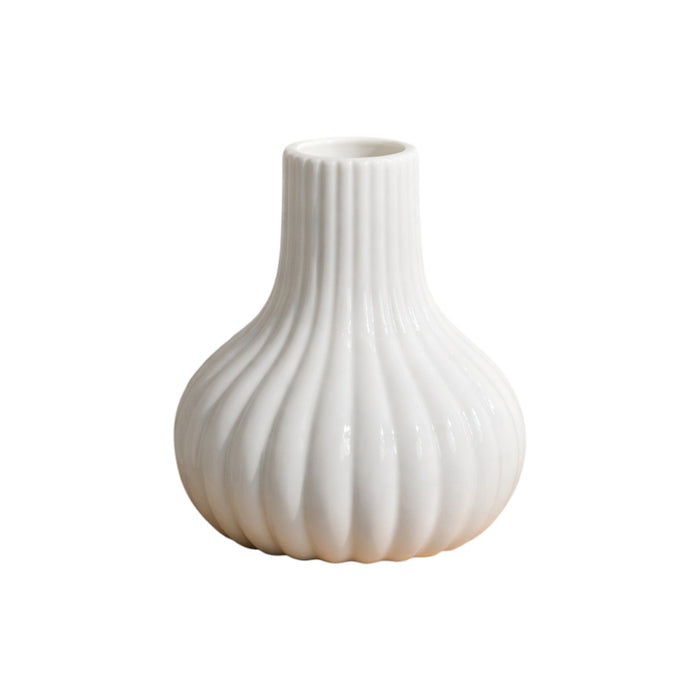 White Frankly Cotton Fluted Ceramic Bud Vase by Nest & Stem Homewares with a textured, elegant design for displaying small flowers.