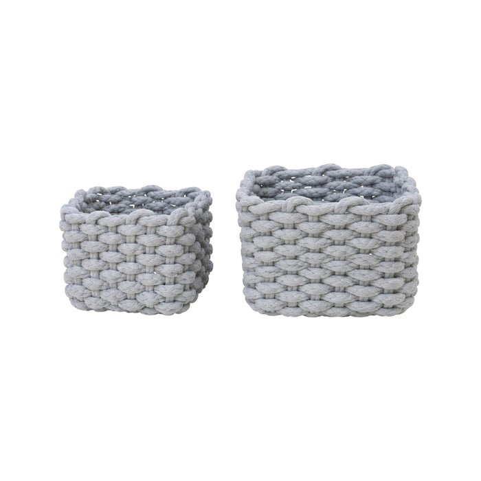 Woven cotton storage basket by Nest & Stem Homewares, featuring a natural woven design and sturdy handles for versatile organization.