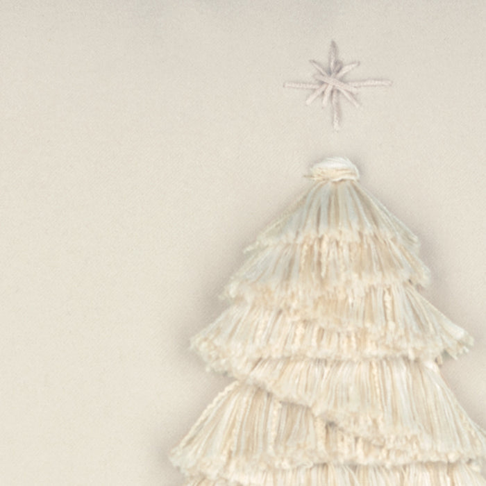 Detail image of Ivory outdoor pillow with holiday tree motif square size for decorative holiday patio decor