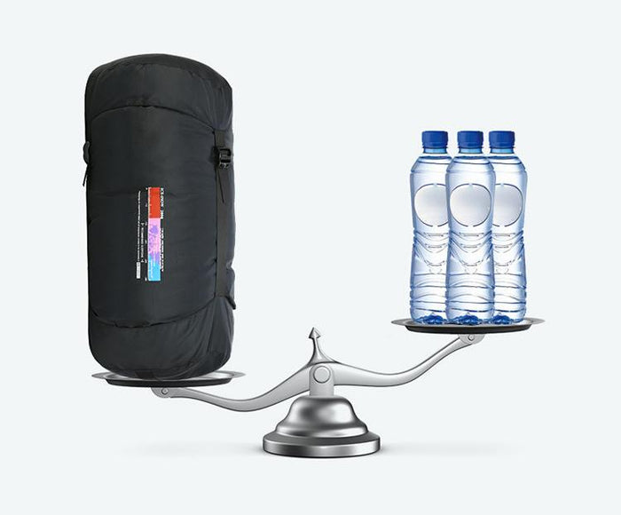 ECOTREK goose down envelope sleeping bag in silver, compact and lightweight for camping and outdoor adventures.