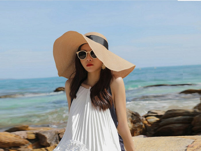 Gray 16cm wide brim straw sun hat for women, floppy derby style, perfect for summer beach and outdoor sun protection.