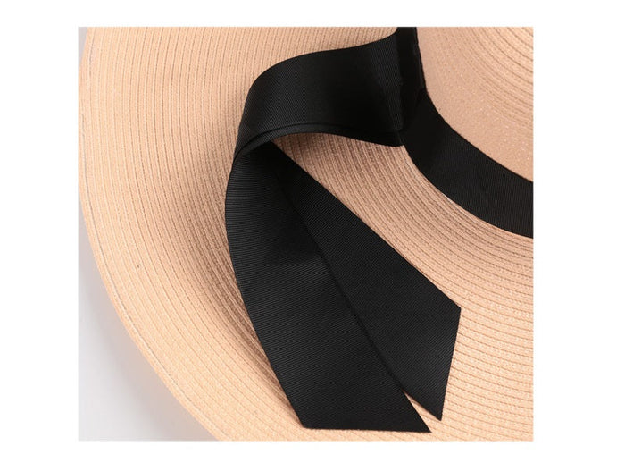 Grey 16cm wide brim straw sun hat for women, floppy derby style, perfect for summer beach and outdoor sun protection.