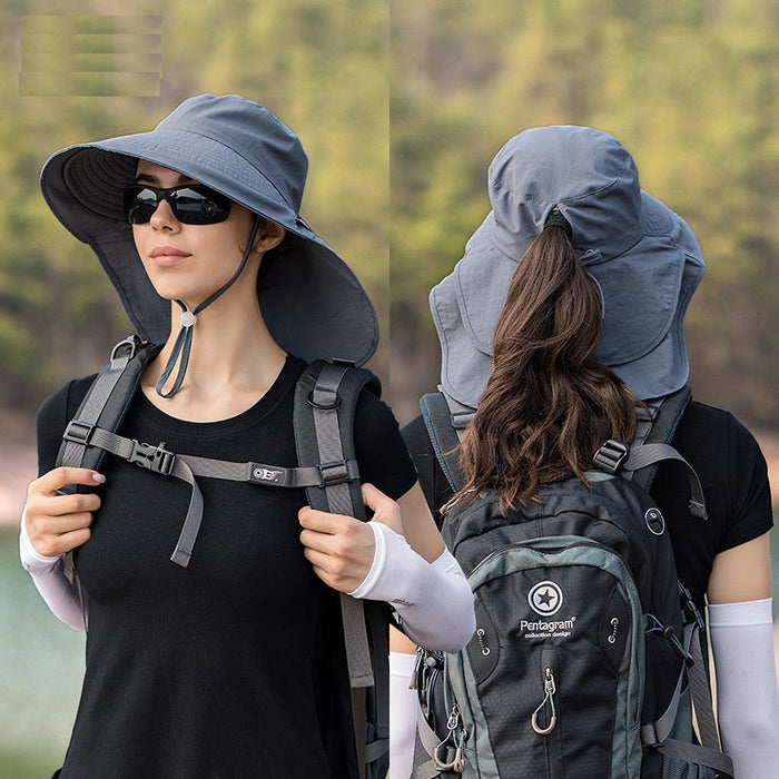Grey wide brim sun hat with UV protection, ideal for outdoor fishing and hiking, featuring a bucket style design.