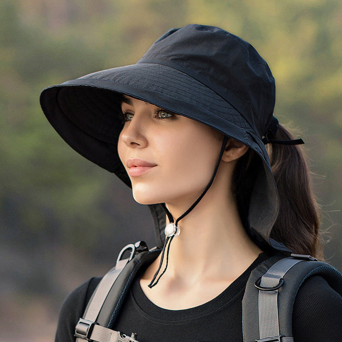 Grey wide brim sun hat with UV protection, ideal for outdoor fishing and hiking, featuring a bucket-style design.