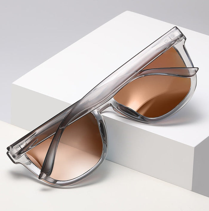 Black sports sunglasses with HD polarized lenses, anti-blue ray coating, hydrophobic finish, designed for active outdoor use.