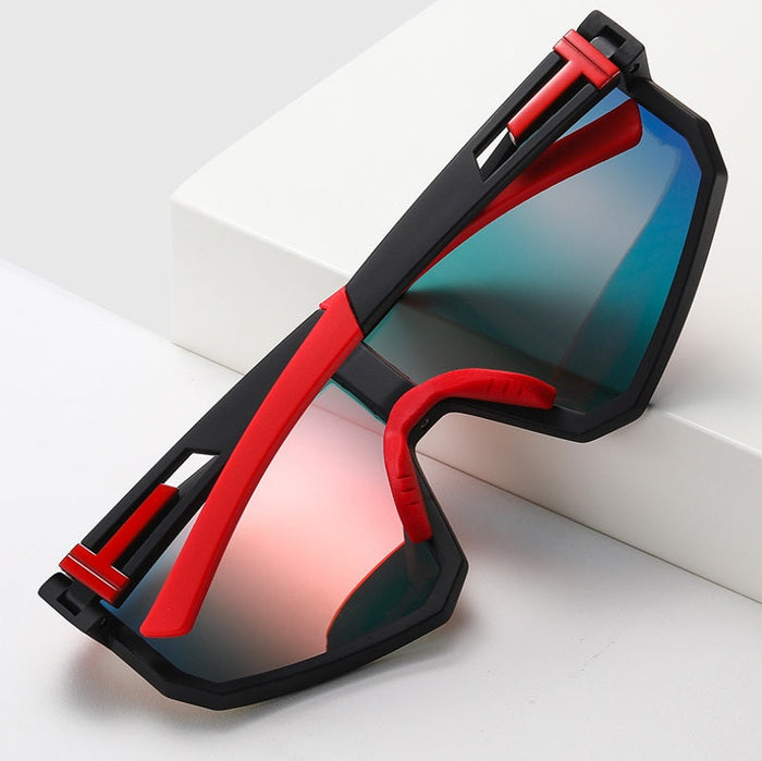 Blue sports sunglasses with HD polarized lenses, anti-blue ray coating, hydrophobic finish, designed for active outdoor use.