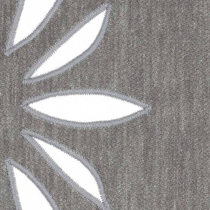Detail image of Gray outdoor pillow with cutout design square size for modern patio decor