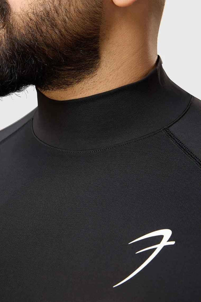 Black high neck compression T-shirt by Fuaark Nz featuring full sleeves, designed for performance wear and athletic support.