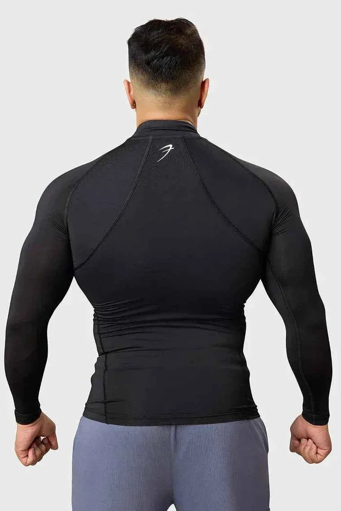 Black high neck compression T-shirt by Fuaark Nz with full sleeves, designed for performance and athletic wear.