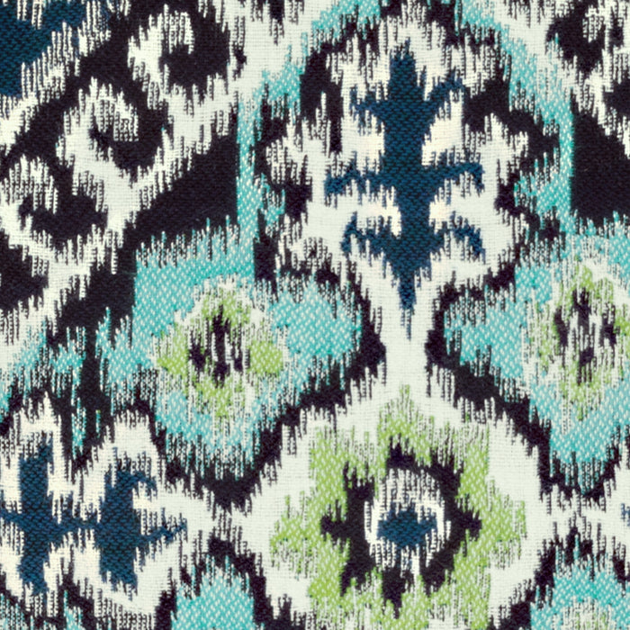 Detail image of Aquamarine and navy ikat patterned outdoor pillow lumbar size for contemporary patio decor