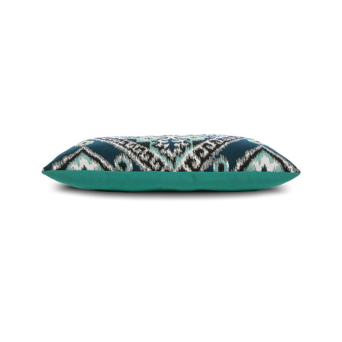 Side image of Aquamarine and navy ikat patterned outdoor pillow lumbar size for contemporary patio decor