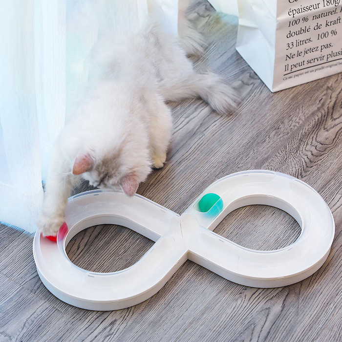 Colorful infinity ball track for cats by dealonline.co.nz, featuring a circular track with a rolling ball for feline play and entertainment.