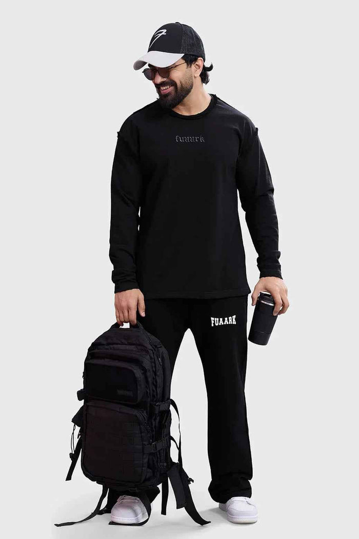 Black Ironclad Tactical Backpack by Fuaark Nz with multiple compartments and durable design for outdoor and tactical use.