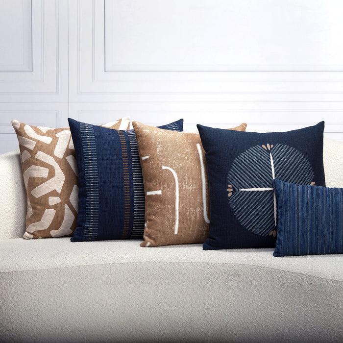 Indoor environmental image of pillows in Crisp white outdoor-safe woven fabric with a soft luxurious texture