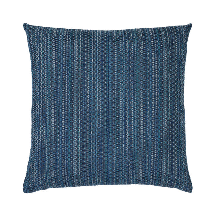 A square throw pillow featuring a textured, woven vertical stripe pattern in shades of blue and navy with subtle white accents, shown against a plain white background.