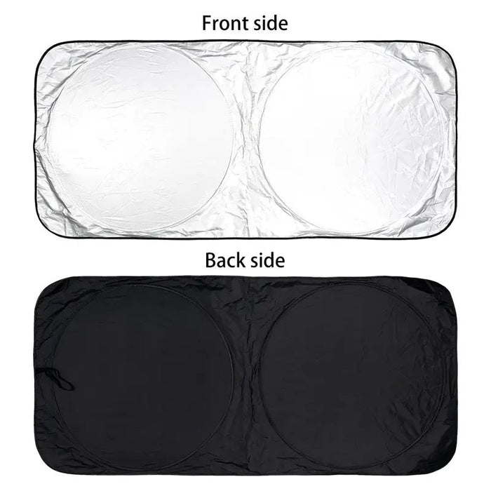 Large silver foldable car sunshade with double-circle design, helps block sunlight and keep vehicle interior cool.