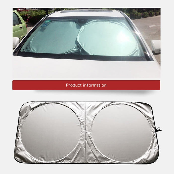 Large silver foldable car sunshade with double-circle design, provides UV protection for vehicle windows.