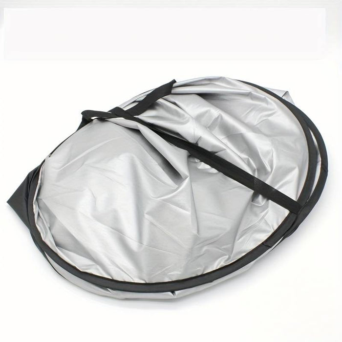 Large silver foldable car sunshade with double-circle design from dealonline.co.nz, visually showing its reflective surface and flexible foldability.